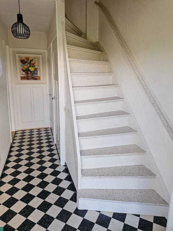 wooden staircase cladding with EarthHarmony terrazzo texture in Den Haag